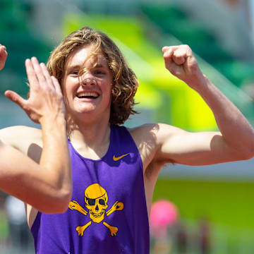 Marshfield's Bodey Lutes celebrates his victory in the Class 4A boys 400 meters at last year's Oregon (OSAA) track and field championships.
