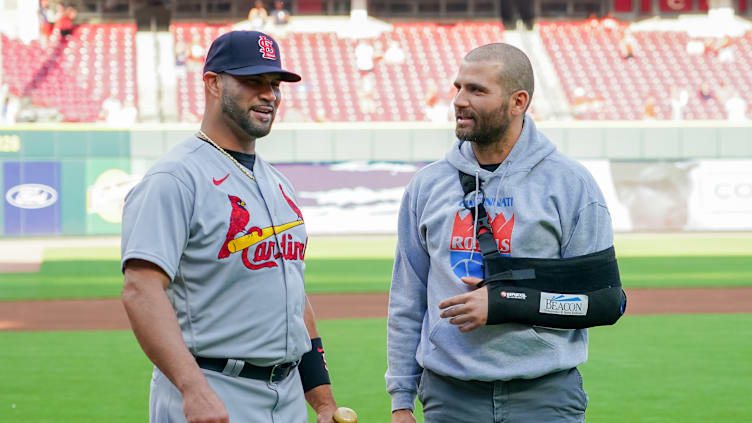 St. Louis Cardinals Albert Pujols with Cincinnati Reds Joey Votto