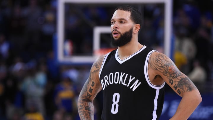 November 13, 2014; Oakland, CA, USA; Brooklyn Nets guard Deron Williams (8) looks on during the fourth quarter against the Golden State Warriors at Oracle Arena. The Warriors defeated the Nets 107-99. Mandatory Credit: Kyle Terada-USA TODAY Sports