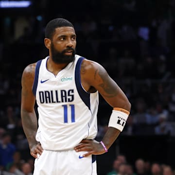 Jun 9, 2024; Boston, Massachusetts, USA; Dallas Mavericks guard Kyrie Irving (11) reacts after a play against the Boston Celtics during the first quarter in game two of the 2024 NBA Finals at TD Garden. Mandatory Credit: Peter Casey-Imagn Images