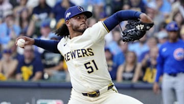 Oct 4, 2025; Milwaukee, Wisconsin, USA; Milwaukee Brewers starting pitcher Freddy Peralta (51) pitches against the Chicago Cubs during the second inning of game one of the NLDS round for the 2025 MLB playoffs at American Family Field. Mandatory Credit: Michael McLoone-Imagn Images