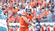 Aug 30, 2025; Charlottesville, Virginia, USA; Virginia Cavaliers quarterback Chandler Morris (4) throws the ball to Cavaliers wide receiver Jahmal Edrine (7) during the second quarter against the Coastal Carolina Chanticleers at Scott Stadium. Mandatory Credit: Amber Searls-Imagn Images