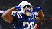 Colts running back Jonathan Taylor became the first player in NFL history to score three touchdowns in three consecutive games against the same team Sunday when the Colts defeated the Titans, 38-14.