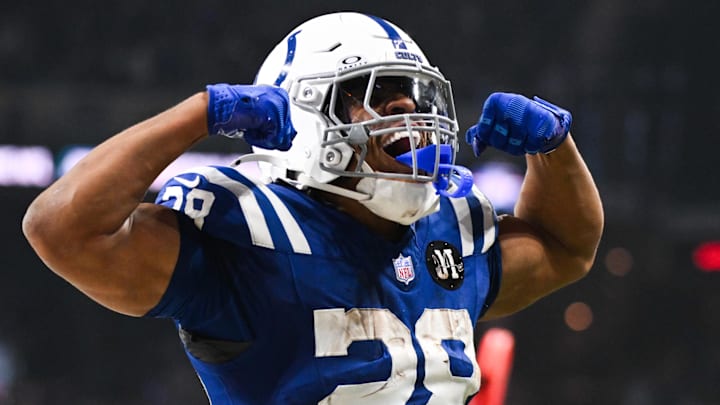 Colts running back Jonathan Taylor became the first player in NFL history to score three touchdowns in three consecutive games against the same team Sunday when the Colts defeated the Titans, 38-14.