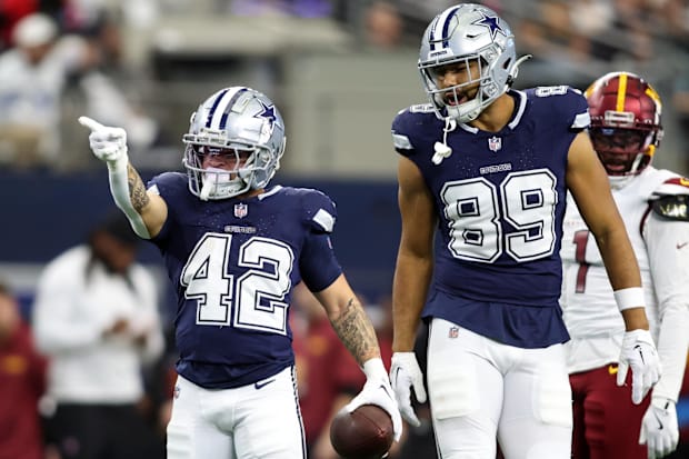 Dallas Cowboys running back Deuce Vaughn reacts after getting a first down against the Washington Commanders.