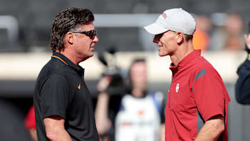 Oklahoma State head football coach Mike Gundy and Oklahoma head football coach Brent Venables