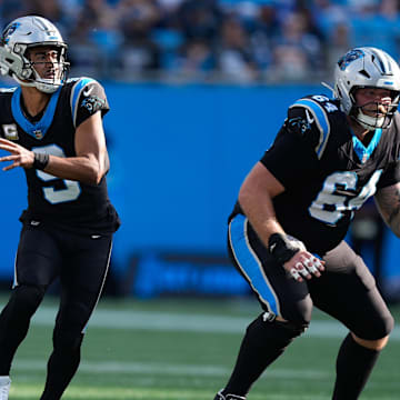 Nov 9, 2025; Charlotte, North Carolina, USA;  Carolina Panthers quarterback Bryce Young (9) looks to pass during the third quarter against the New Orleans Saints at Bank of America Stadium. Mandatory Credit: Jim Dedmon-Imagn Images