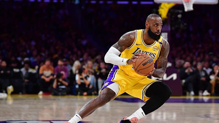 Apr 30, 2025; Los Angeles, California, USA; Los Angeles Lakers forward LeBron James (23) controls the ball against the Minnesota Timberwolves during the first half in game five of first round for the 2025 NBA Playoffs at Crypto.com Arena. Mandatory Credit: Gary A. Vasquez-Imagn Images