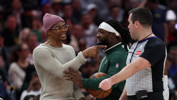 Mar 10, 2024; Los Angeles, California, USA;  Los Angeles Clippers guard Russell Westbrook (left) talks with Milwaukee Bucks guard Patrick Beverley (21) during the second half at Crypto.com Arena.