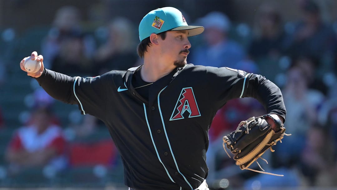 Feb 22, 2026; Salt River Pima-Maricopa, Arizona, USA; Arizona Diamondbacks pitcher Kade Strowd (24) delivers to the plate in the third inning against the Los Angeles Angels at Salt River Fields at Talking Stick. Mandatory Credit: Jayne Kamin-Oncea-Imagn Images Feb 22, 2026; Salt River Pima-Maricopa, Arizona, USA; Arizona Diamondbacks pitcher Kade Strowd (24) delivers to the plate in the third inning against the Los Angeles Angels at Salt River Fields at Talking Stick. Mandatory Credit: Jayne Kamin-Oncea-Imagn Images