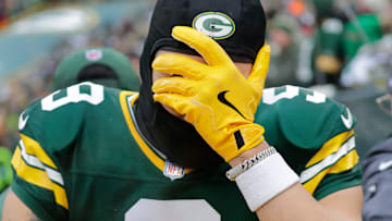 Green Bay Packers wide receiver Christian Watson (9) leaves the field on a cart after getting injured against the Chicago Bears in the second quarter during their football game Sunday, January 5, 2025, at Lambeau Field in Green Bay, Wisconsin.