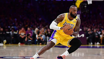 Apr 30, 2025; Los Angeles, California, USA; Los Angeles Lakers forward LeBron James (23) controls the ball against the Minnesota Timberwolves during the first half in game five of first round for the 2025 NBA Playoffs at Crypto.com Arena. Mandatory Credit: Gary A. Vasquez-Imagn Images