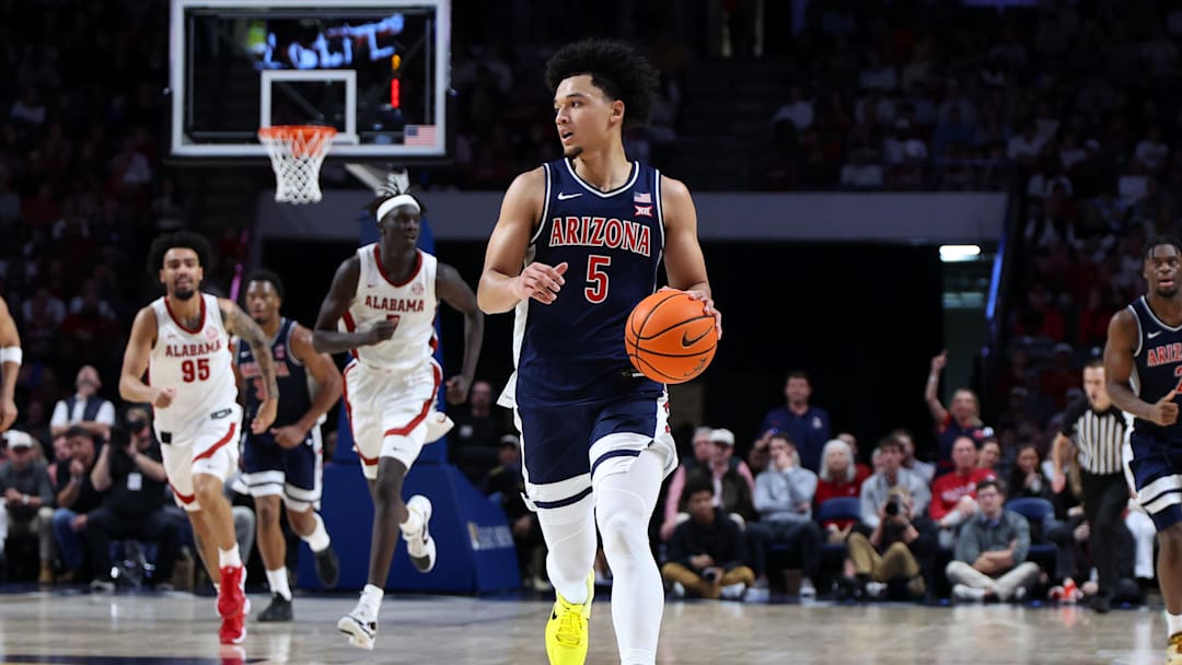 Dec 13, 2025; Birmingham, Alabama, USA; Arizona Wildcats guard Brayden Burries (5) dribbles down court during the second half against the Alabama Crimson Tide at Legacy Arena at BJCC. Mandatory Credit: David Leong-Imagn Images