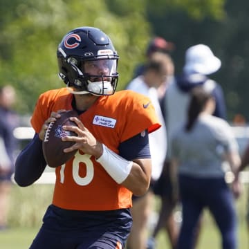 Jul 27, 2024; Lake Forest, IL, USA; Chicago Bears quarterback Caleb Williams (18) throws  a pass during Chicago Bears Training Camp at Halas Hall. Mandatory Credit: David Banks-USA TODAY Sports
