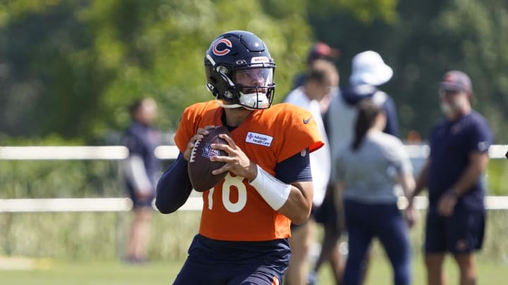 Jul 27, 2024; Lake Forest, IL, USA; Chicago Bears quarterback Caleb Williams (18) throws  a pass during Chicago Bears Training Camp at Halas Hall. Mandatory Credit: David Banks-USA TODAY Sports