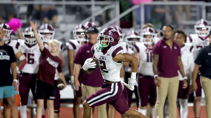 Jenks' Kaydin Jones runs for a touchdown during the high school football game between Norman North and Jenks at Harve Collins Field in Norman, Okla., Thursday, Oct. 5, 2023.