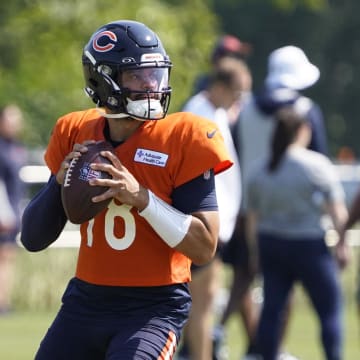 Jul 27, 2024; Lake Forest, IL, USA; Chicago Bears quarterback Caleb Williams (18) throws  a pass during Chicago Bears Training Camp at Halas Hall. Mandatory Credit: David Banks-USA TODAY Sports