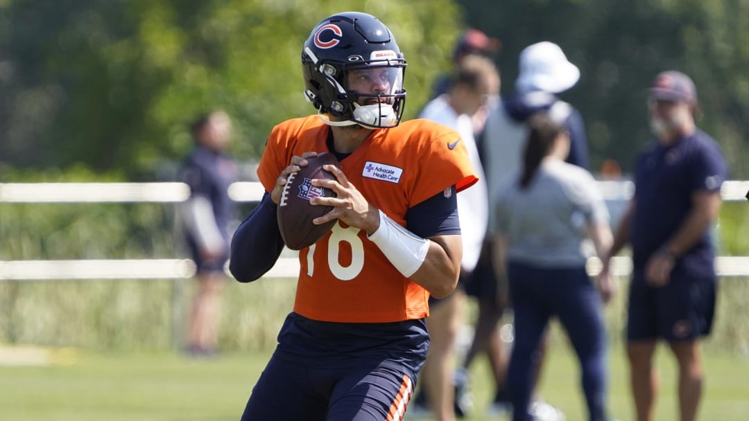 Jul 27, 2024; Lake Forest, IL, USA; Chicago Bears quarterback Caleb Williams (18) throws  a pass during Chicago Bears Training Camp at Halas Hall. Mandatory Credit: David Banks-USA TODAY Sports