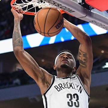 Mar 21, 2024; Milwaukee, Wisconsin, USA; Brooklyn Nets center Nicolas Claxton (33) dunks the ball in the third quarter against the Milwaukee Bucks at Fiserv Forum. Mandatory Credit: Benny Sieu-Imagn Images