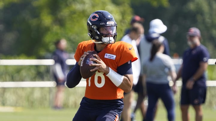 Jul 27, 2024; Lake Forest, IL, USA; Chicago Bears quarterback Caleb Williams (18) throws  a pass during Chicago Bears Training Camp at Halas Hall. Mandatory Credit: David Banks-USA TODAY Sports