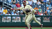 Jun 18, 2024; Omaha, NE, USA; Florida State Seminoles third baseman Cam Smith (24) throws to first base against the North Carolina Tar Heels during the first inning at Charles Schwab Field Omaha. 