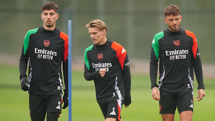 Martin Odegaard is back in training, but Arsenal will be without its other midfield star when it travels to face Inter Milan.