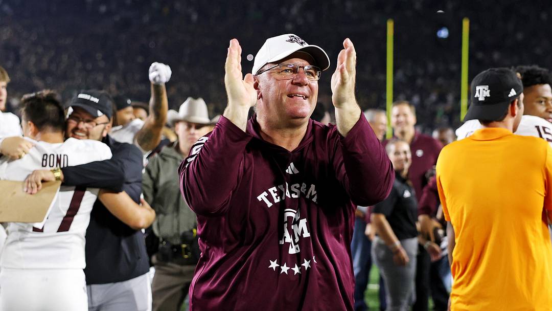 Sep 13, 2025; South Bend, Indiana, USA; Texas A&M Aggies head coach Mike Elko celebrates after the game against Notre Dame Fighting Irish at Notre Dame Stadium. Mandatory Credit: Trevor Ruszkowski-Imagn Images