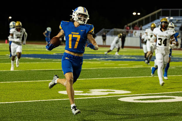 Frenship's Leyton Stone runs the ball in a non-district football game against Abilene Highon Sept. 15, 2023.