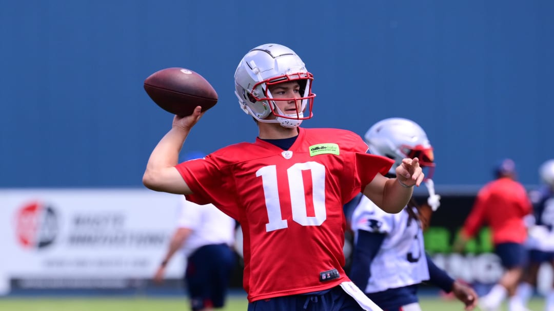 Jun 10, 2024; Foxborough, MA, USA; New England Patriots quarterback Drake Maye (10) throws a pass at minicamp at Gillette Stadium. Mandatory Credit: Eric Canha-USA TODAY Sports