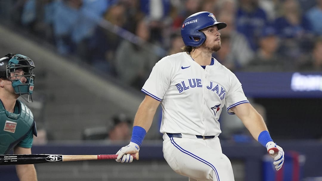 Toronto Blue Jays third baseman Addison Barger (47) hits a two run home run against the Seattle Mariners in the third inning during game six of the ALCS round for the 2025 MLB playoffs at Rogers Centre. 
