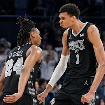 Mar 17, 2024; Austin, Texas, USA; San Antonio Spurs forward Victor Wembanyama (1) and guard Devin Vassell (24) react during overtime against the Brooklyn Nets at Moody Center. Mandatory Credit: Scott Wachter-Imagn Images