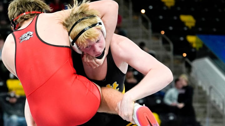 Bettendorf’s Lincoln Jipp wresltes Linn-Mar’s Philip Jacobs in the 175-pound championship during the Dan Gable Donnybrook wrestling tournament finals Saturday, Dec. 7, 2024 at Xtream Arena in Coralville, Iowa.