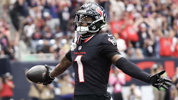 Sep 29, 2024; Houston, Texas, USA; Houston Texans wide receiver Stefon Diggs (1) scores against the Jacksonville Jaguars in the first quarter at NRG Stadium. Mandatory Credit: Thomas Shea-Imagn Images