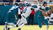 Seattle Seahawks DeMarcus Lawrence (0) gets a hand one Jacksonville Jaguars quarterback Trevor Lawrence (16) during the third quarter in an NFL football game at EverBank Stadium, Sunday, Oct. 12, 2025, in Jacksonville, Fla. [Doug Engle/Florida Times-Union]
