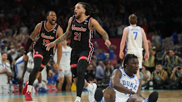 Houston Cougars guard Emanuel Sharp and Houston Cougars forward J'Wan Roberts celebrate defeating the Duke Blue Devils in the semifinals of the men's Final Four of the 2025 NCAA Tournament at the Alamodome. 