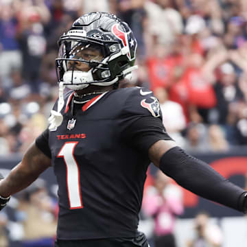 Sep 29, 2024; Houston, Texas, USA; Houston Texans wide receiver Stefon Diggs (1) scores against the Jacksonville Jaguars in the first quarter at NRG Stadium. Mandatory Credit: Thomas Shea-Imagn Images