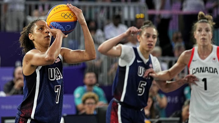 Aug 5, 2024; Paris, France; United States player Cierra Burdick (7) shoots a free throwagainst Canada in the women’s 3x3 basketball bronze medal game during the Paris 2024 Olympic Summer Games at La Concorde 1. Mandatory Credit: Michael Madrid-Imagn Images