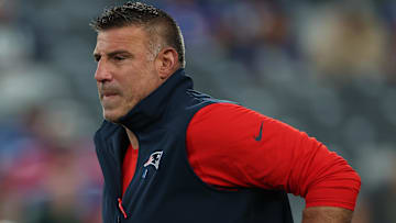 Aug 21, 2025; East Rutherford, New Jersey, USA; New England Patriots head coach Mike Vrabel runs the field before the preseason game against the New York Giants at MetLife Stadium. Mandatory Credit: Vincent Carchietta-Imagn Images