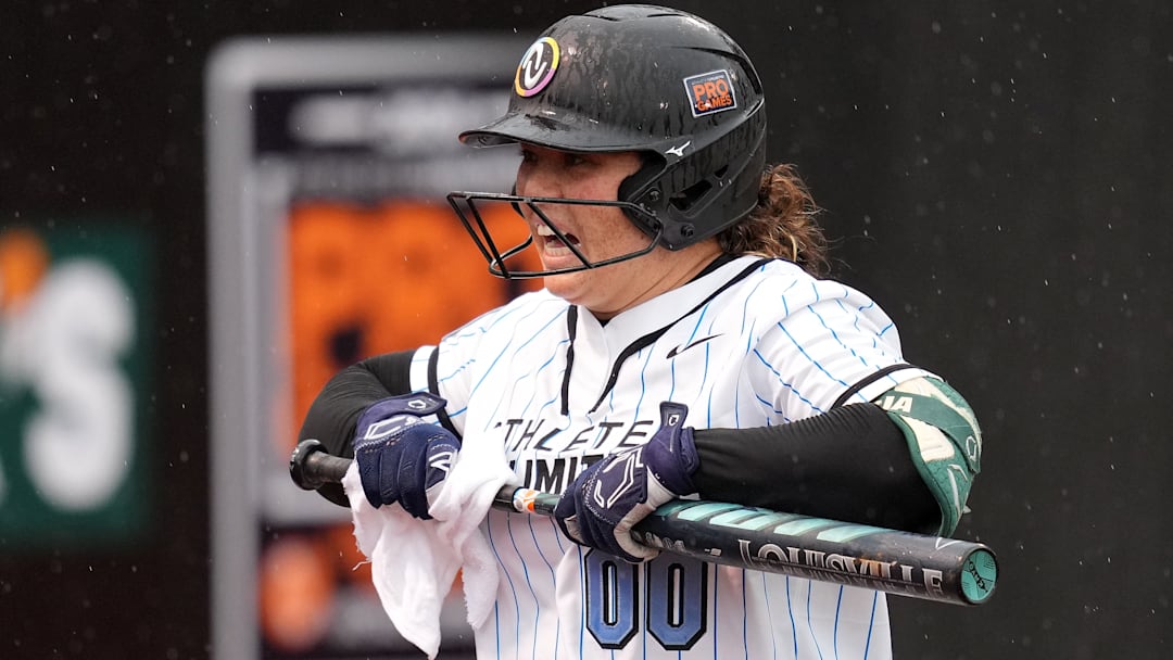 Rachel Garcia, AUSL All-Star Cup pitcher and member of Team Lorenz, dries off her bat as a member of Team McQuillin during an Athletes Unlimited Pro Championship (the former name of the league) game against Team Kilfoyl at Max R. Joyner Stadium on Aug. 7. 2024 in Greenville, N.C.