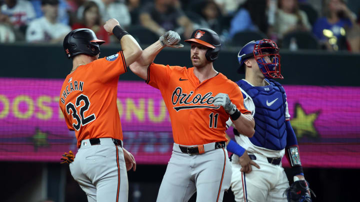 Jul 20, 2024; Arlington, Texas, USA; Baltimore Orioles second baseman Jordan Westburg (11) celebrates with first baseman Ryan O'Hearn (32) after hitting a two run home run against the Texas Rangers in the sixth inning at Globe Life Field.