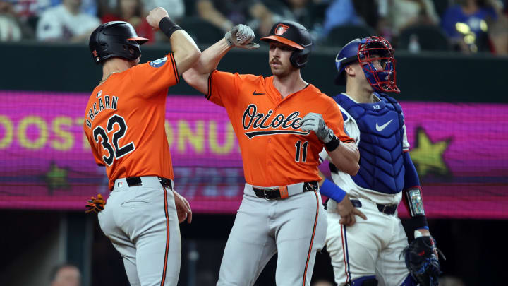 Jul 20, 2024; Arlington, Texas, USA; Baltimore Orioles second base Jordan Westburg (11) celebrates with first base Ryan O'Hearn (32) after hitting a two run home run against the Texas Rangers in the sixth inning at Globe Life Field. Mandatory Credit: Tim Heitman-USA TODAY Sports