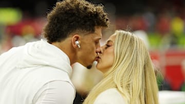 Feb 9, 2025; New Orleans, LA, USA; Kansas City Chiefs quarterback Patrick Mahomes (15) kisses his wife Brittany Mahomes before Super Bowl LIX between the Philadelphia Eagles and the Kansas City Chiefs at Caesars Superdome.