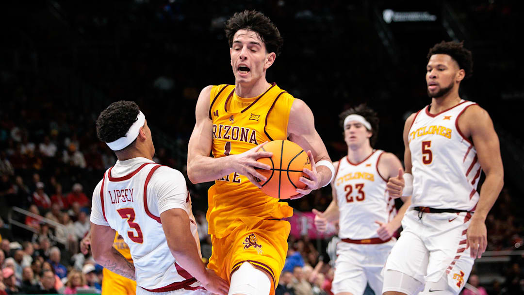 Mar 11, 2026; Kansas City, MO, USA; Arizona State Sun Devils forward Santiago Trouet (1) collides with Iowa State Cyclones guard Nate Heise (0) during the second half at T-Mobile Center. Mandatory Credit: William Purnell-Imagn Images