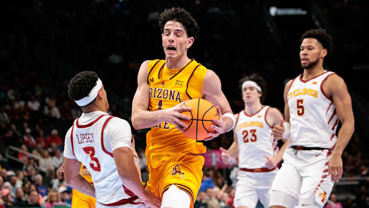 Mar 11, 2026; Kansas City, MO, USA; Arizona State Sun Devils forward Santiago Trouet (1) collides with Iowa State Cyclones guard Nate Heise (0) during the second half at T-Mobile Center. Mandatory Credit: William Purnell-Imagn Images