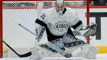 Mar 27, 2025; Denver, Colorado, USA; Los Angeles Kings goaltender David Rittich (31) watches the puck on a shot in the first period against the Colorado Avalanche at Ball Arena. Mandatory Credit: Isaiah J. Downing-Imagn Images