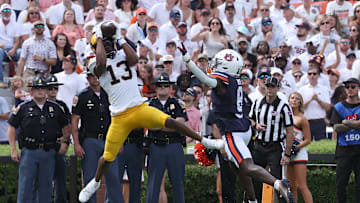 Sep 7, 2024; Auburn, Alabama, USA;  California Golden Bears wide receiver Nyziah Hunter (13) catches a pass for a touchdown as Auburn Tigers cornerback Antonio Kite (8) defends during the first quarter at Jordan-Hare Stadium. Mandatory Credit: John Reed-Imagn Images