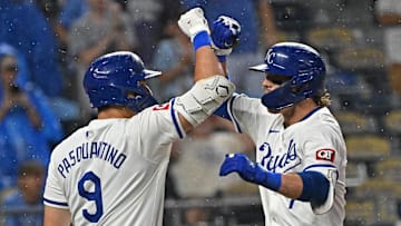 Jul 2, 2024; Kansas City, Missouri, USA; Kansas City Royals shortstop Bobby Witt Jr. (7) celebrates with Vinnie Pasquantino (9) after hitting a solo home run in the sixth inning against the Tampa Bay Rays at Kauffman Stadium. Mandatory Credit: Peter Aiken-USA TODAY Sports