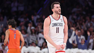 UConn is a 13.5-point favorite against Texas in Friday's college basketball action.