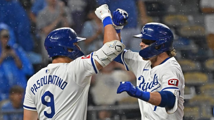 Jul 2, 2024; Kansas City, Missouri, USA; Kansas City Royals shortstop Bobby Witt Jr. (7) celebrates with Vinnie Pasquantino (9) after hitting a solo home run in the sixth inning against the Tampa Bay Rays at Kauffman Stadium. Mandatory Credit: Peter Aiken-USA TODAY Sports