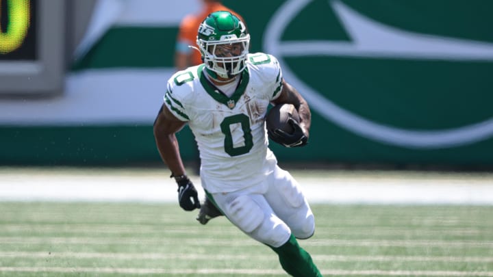 Aug 10, 2024; East Rutherford, New Jersey, USA; New York Jets running back Braelon Allen (0) carries the ball during the first half against the Washington Commanders at MetLife Stadium. 